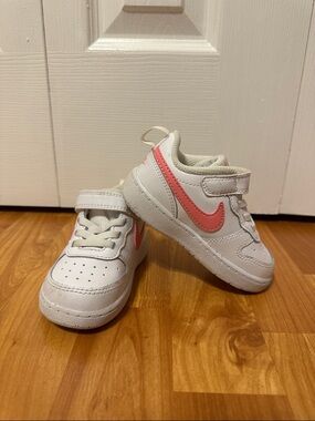 Nike Kids White Sneakers with Coral Pink Swoosh